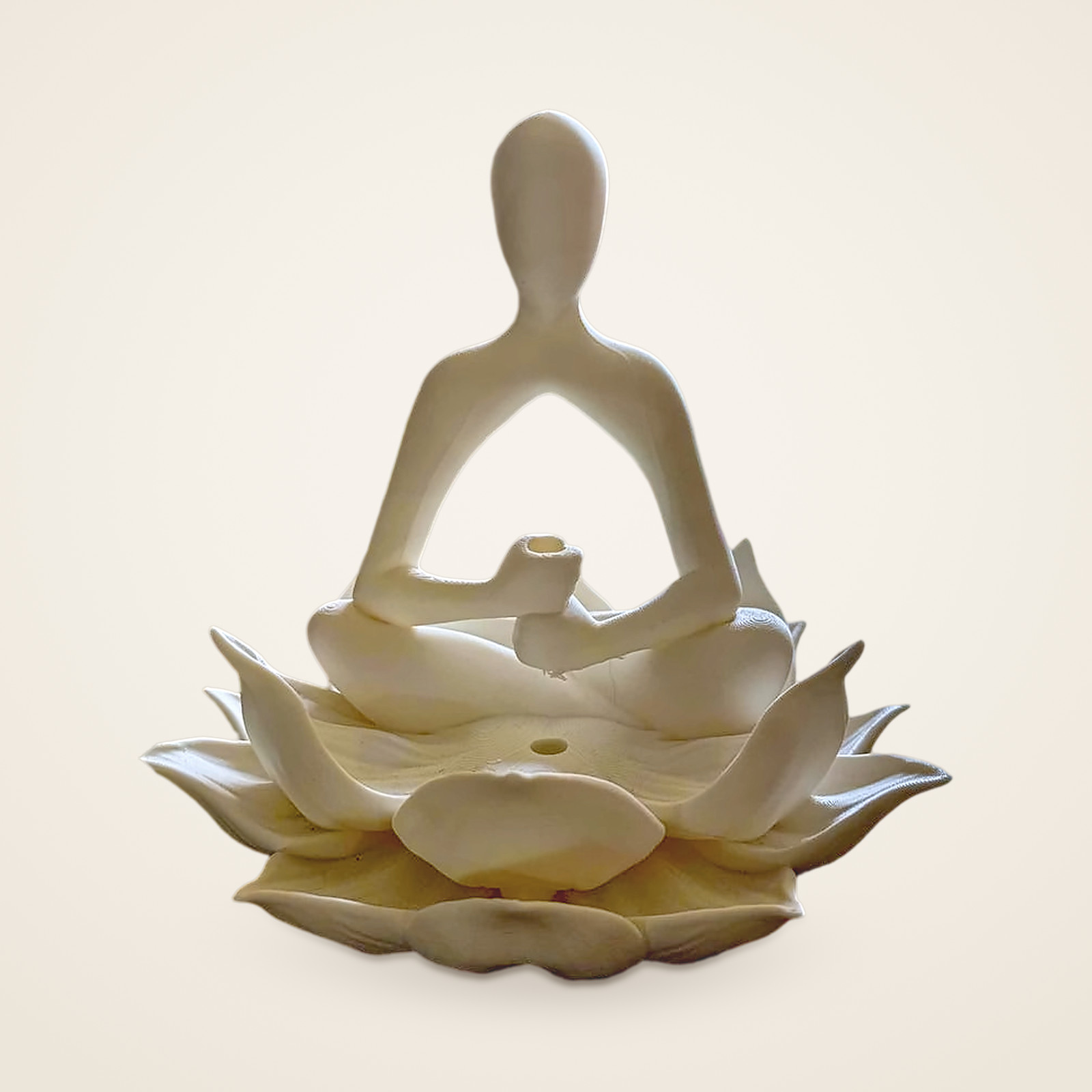 White lotus keeper statuette, a seated figure framed by layered petals.